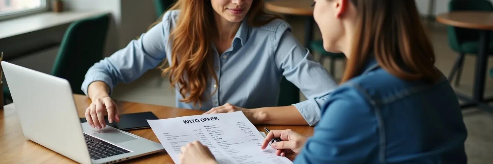 A candidate discussing a job offer with a hiring manager in a relaxed, professional setting, representing confident salary negotiation.